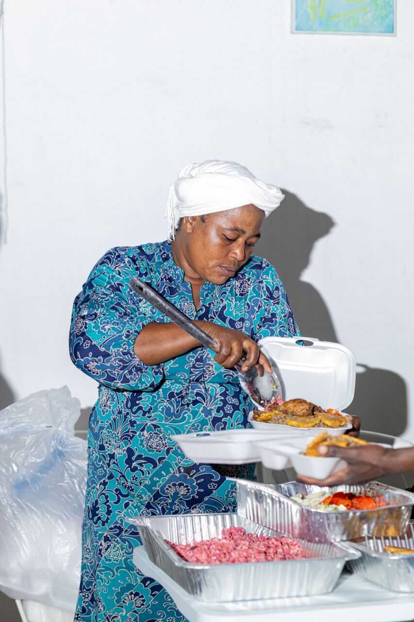 Volunteer Serving Iftar Meals